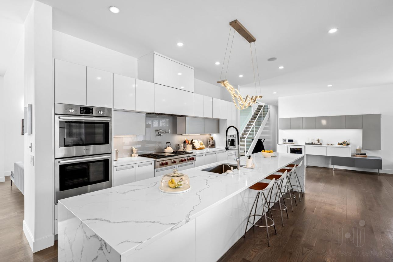 Modern kitchen design with sleek cabinetry and premium finishes