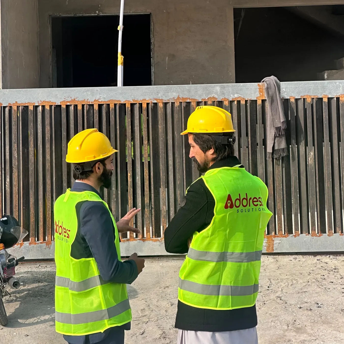 Land surveying and site inspection at a construction site
